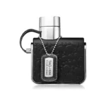 Frasco del perfume Armaf Tag Him EDP con diseño urbano en tonos metálicos y cuero. Fragancia fresca y versátil para el hombre moderno y activo.