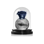 Lattafa Pride Thouq Eau de Parfum — fragancia unisex elegante y moderna con notas florales, ambaradas y almizcladas; perfume de larga duración que refleja lujo y sofisticación en frasco plateado con tapa en forma de rosa azul bajo cúpula transparente.